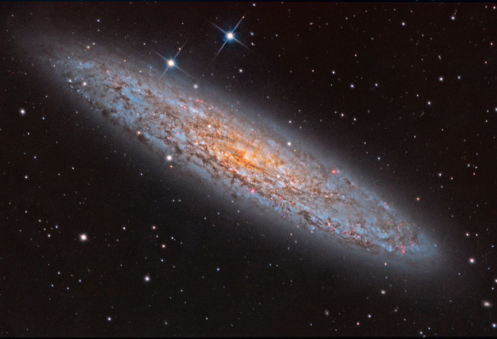 NGC 253: Universo da Ilha Empoeirada